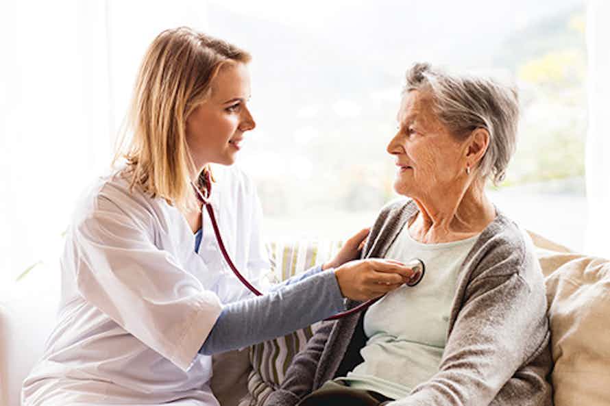 Nurse from the Screening for Life program treating a patient
